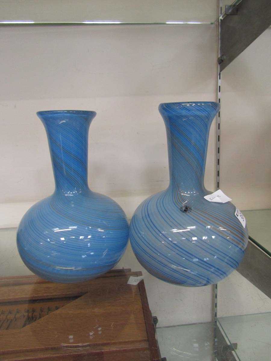 A pair of mid-20th century style blue glass vases