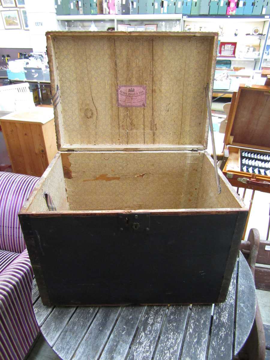 A 19th century wooden, oil skin and metalwork travelling trunk by retailer Henry Pound and Sons - Image 3 of 3