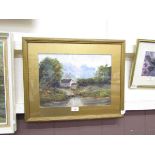 A framed and glazed oil of cottage by lake scene