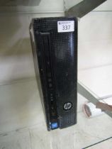 An HP desktop computer tower, purportedly containing retro games (No PSU)