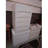 Two white painted chests of drawers