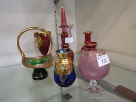 A selection of gilt decorated and other coloured glassware to include decanter, vases, basket, etc