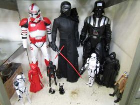 A selection of Star Wars figures, including three 1/2 full size