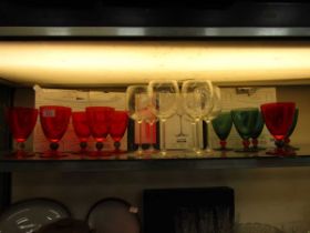 An assortment of eighteen various crystal glasses with boxes consisting of red and green drinking