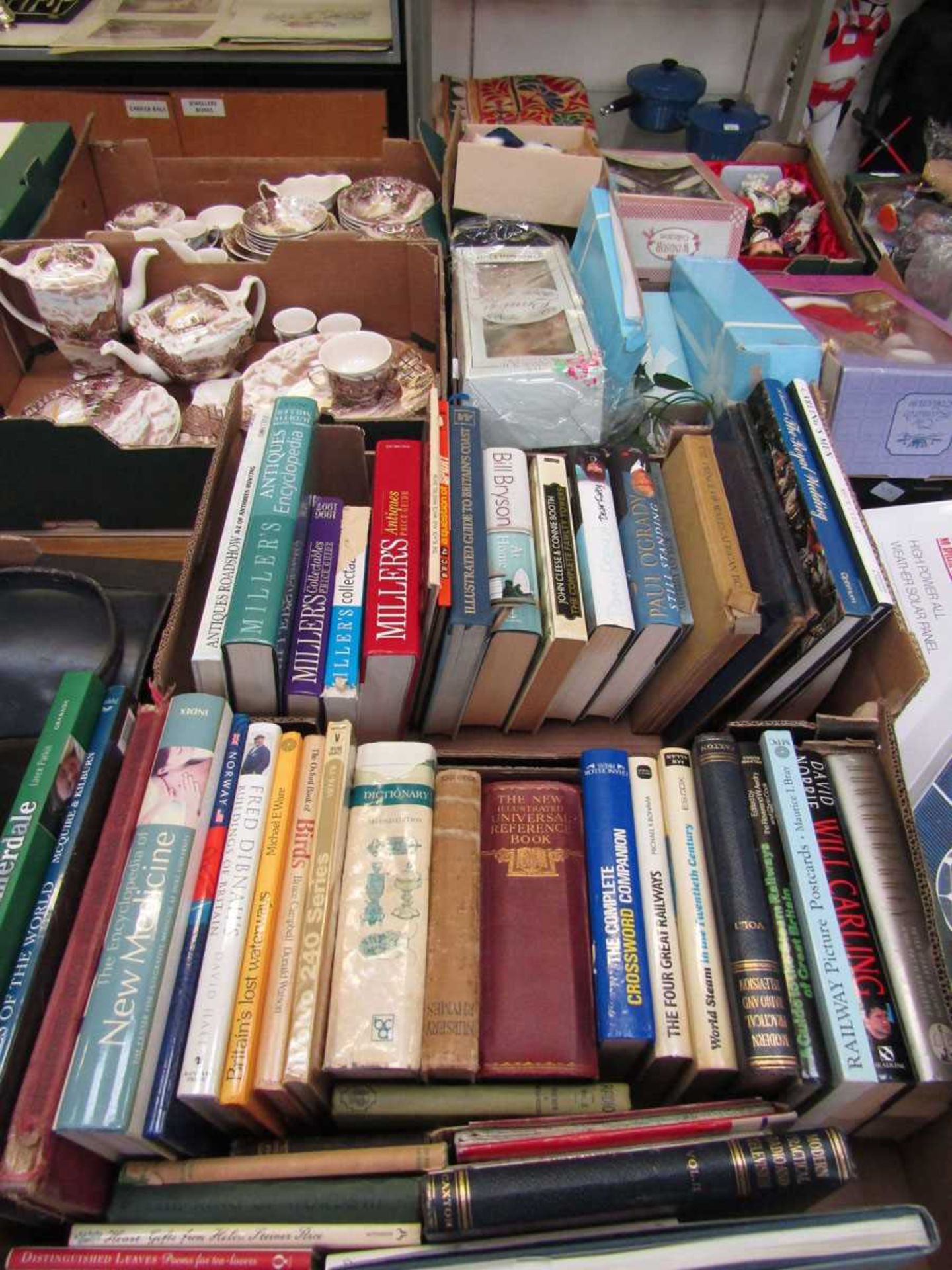 Two trays of mainly hard back books relating to various subjects to include birds, crossword, Will