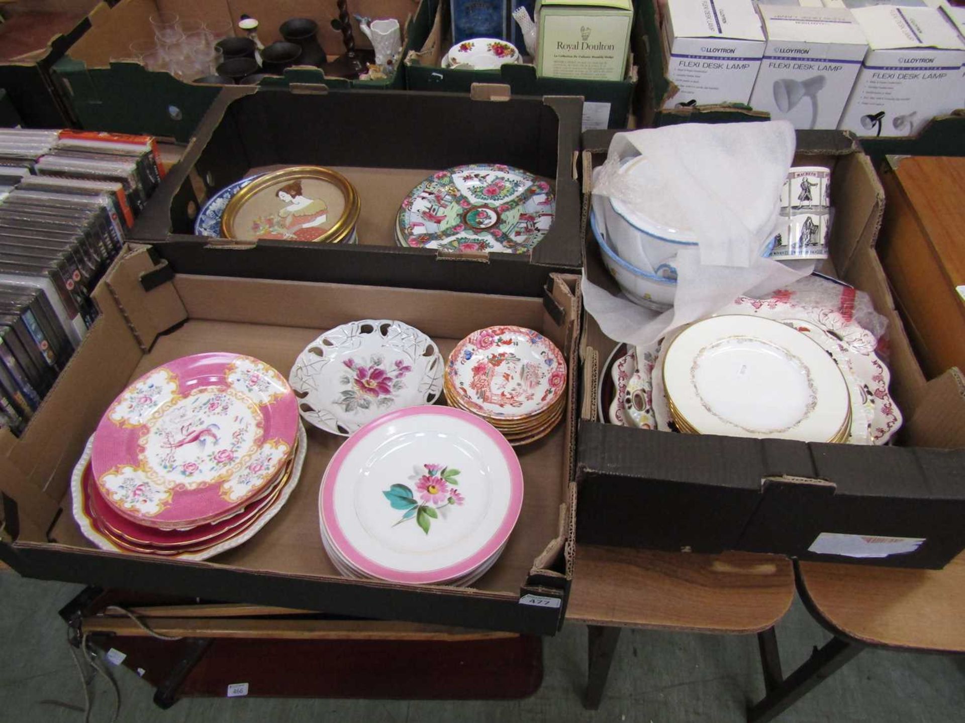 Three trays of decorative ceramic plates, etc