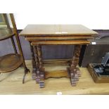 A nest of three oak occasional tables