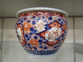 A white ground oriental style ceramic planter with Imari style decoration (A/F)