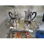 A plated tea/coffee set consisting of teapot, coffee pot, cream jug, sugar bowl and twin handled
