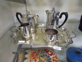 A plated tea/coffee set consisting of teapot, coffee pot, cream jug, sugar bowl and twin handled