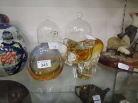 An assortment of four items of glassware consisting of paperweight, Fifth Avenue Crystal paperweight