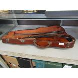 A 20th century violin in hard carry case with two bows (One bow damaged)