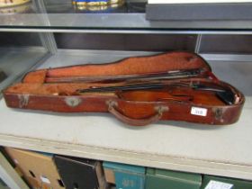 A 20th century violin in hard carry case with two bows (One bow damaged)