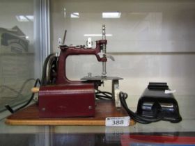 A small travelling electric sewing machine