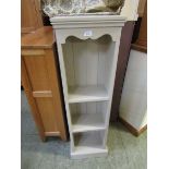 A grey painted pine bookcase