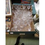 A tray containing cut glassware to include claret jug, etc