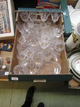 A tray containing cut glassware to include claret jug, etc
