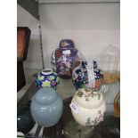 Five ginger jars, one minus lid, to include Sadler floral decorated jar, plain blue ground jar,