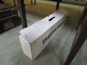 A boxed Sharper Image scooter