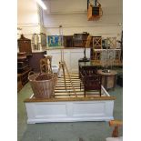 A five foot modern pine cream painted bedstead with slats