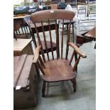 An elm spindle back Windsor chair