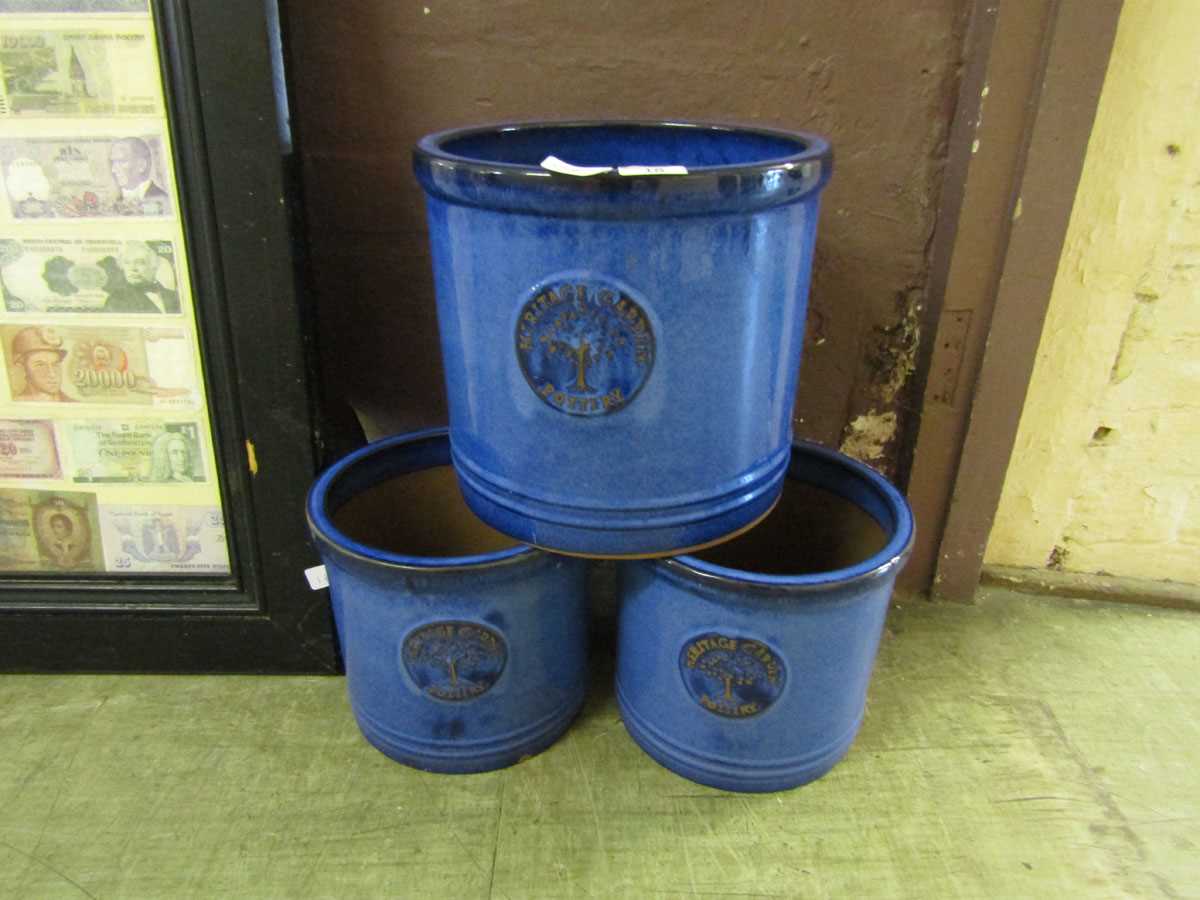 Three blue glazed garden pots