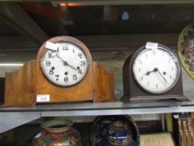 A mid-20th century design burr walnut cased mantel clock along with a Bakelite cased Enfield