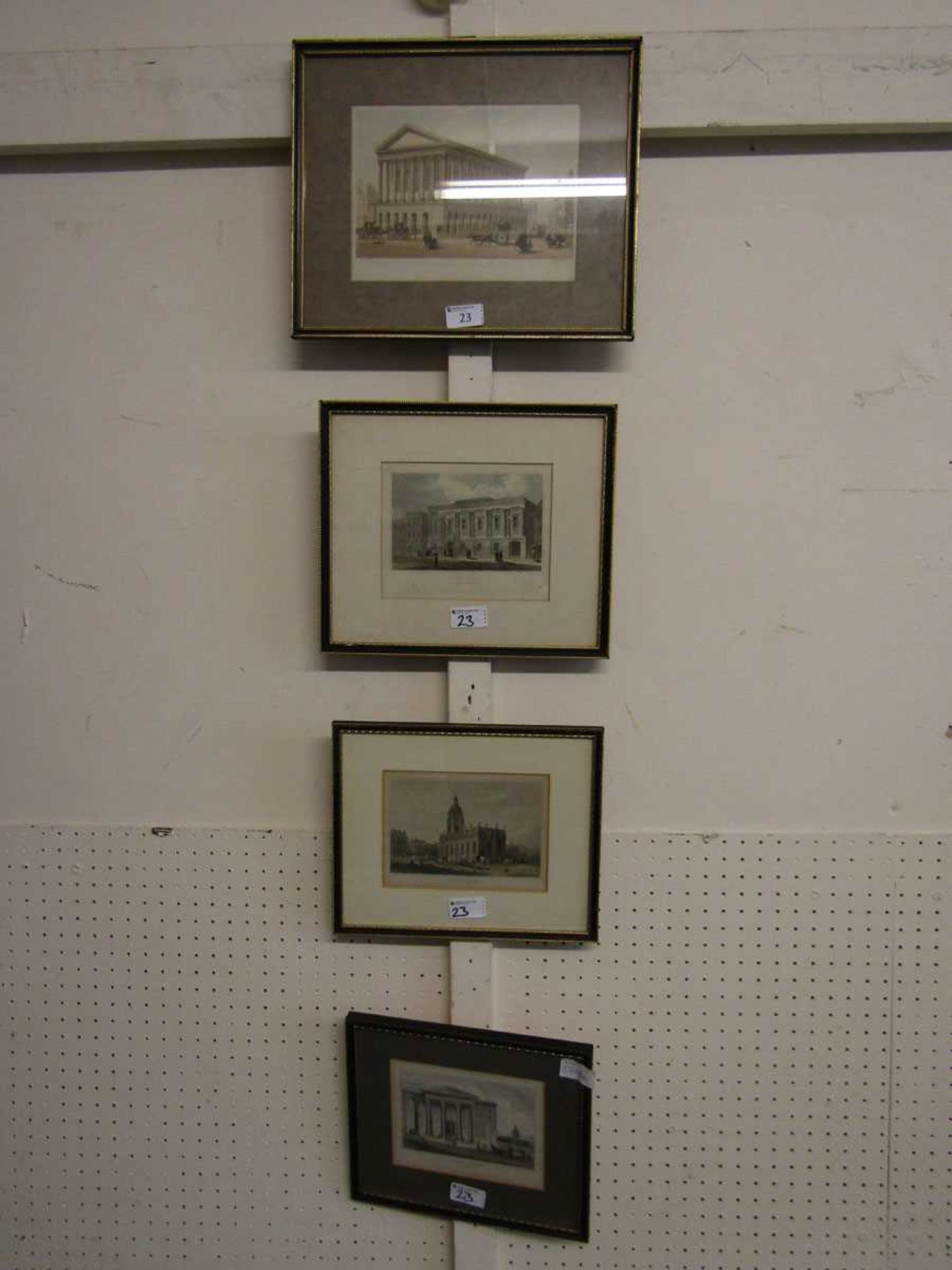 Four framed and glazed coloured etchings of Georgian buildings