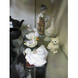 A selection of ceramic ducks, cats and young boy with ball by Nao etc.