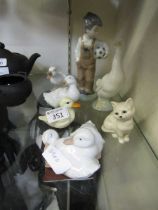 A selection of ceramic ducks, cats and young boy with ball by Nao etc.