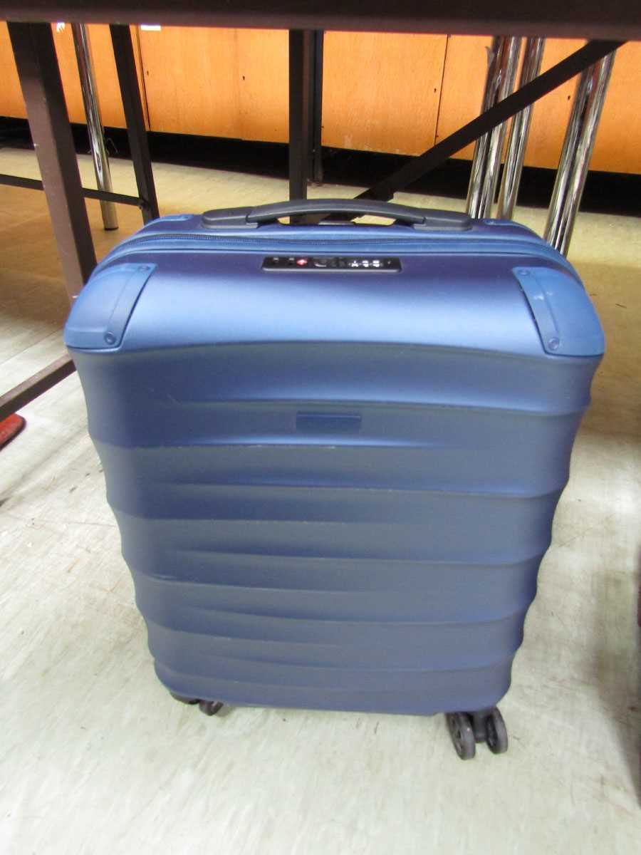 A John Lewis blue hard case suitcase