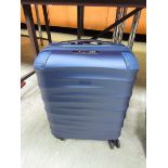 A John Lewis blue hard case suitcase