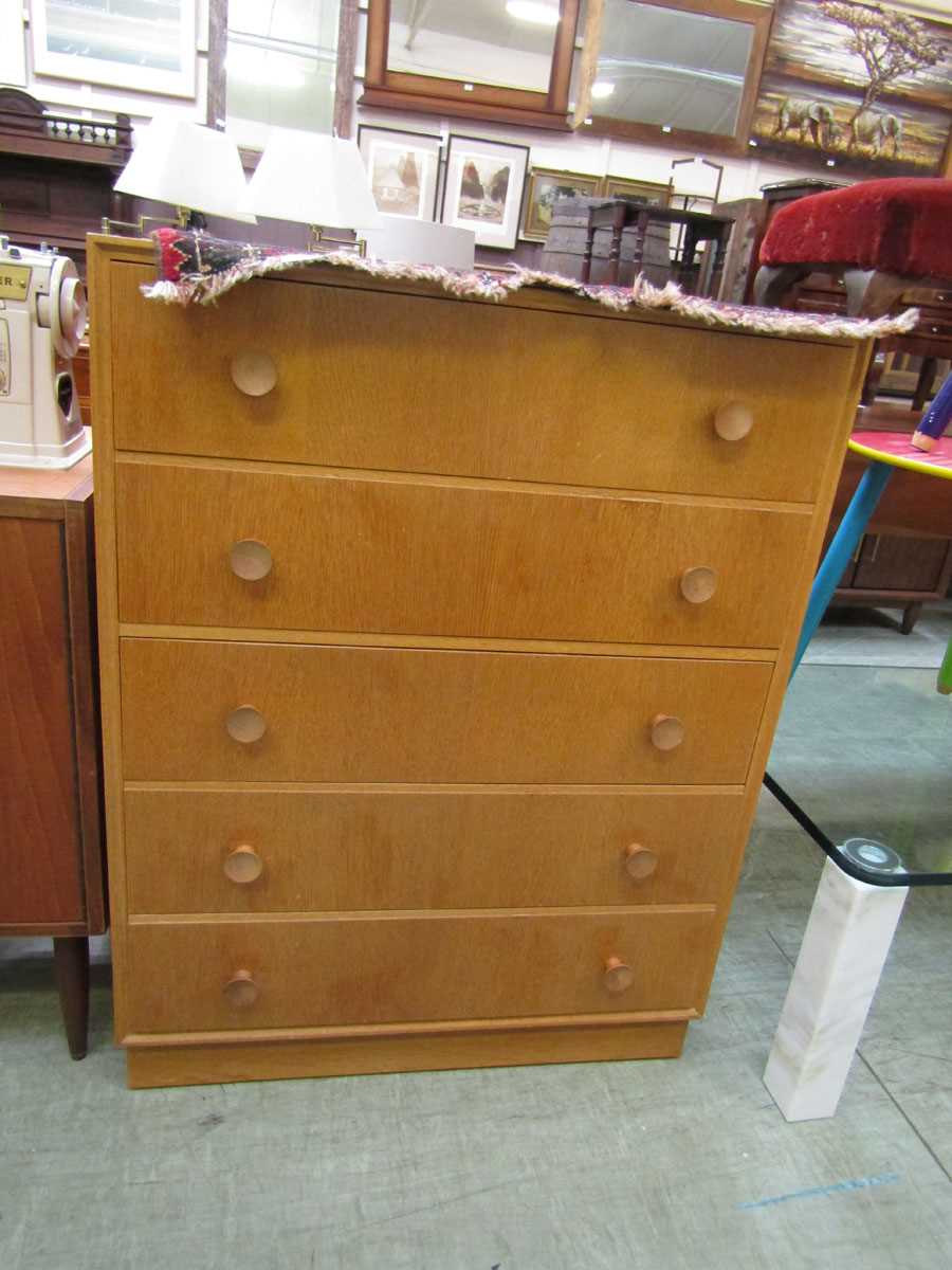 A mid-20th century Meridew chest of five drawers