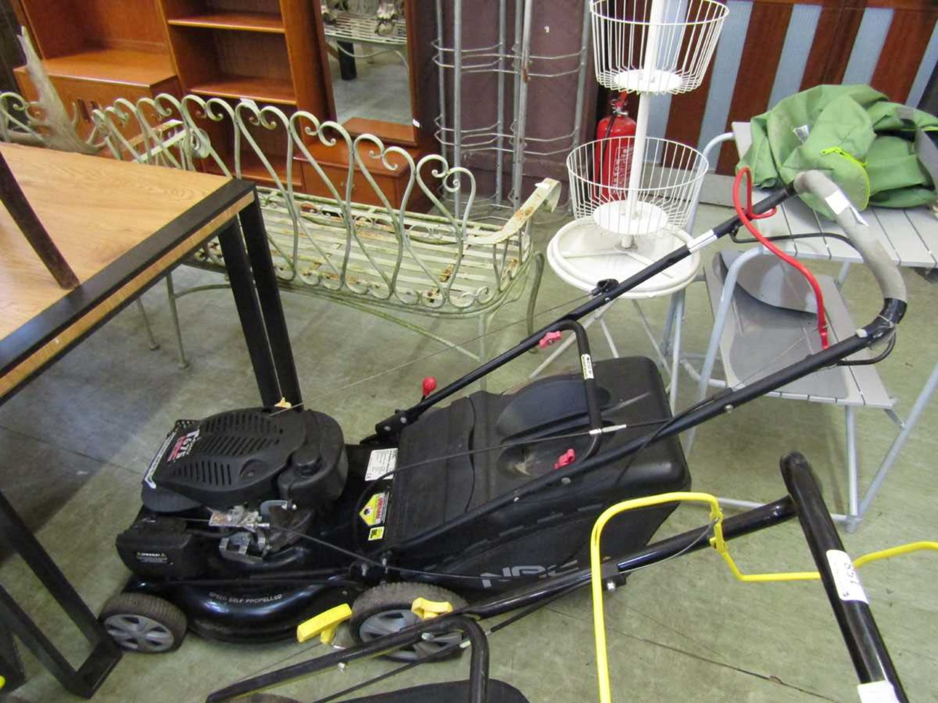 An NAC self propelled petrol lawnmower