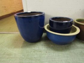 Three blue glazed garden pots