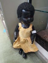 A mid-20th century doll