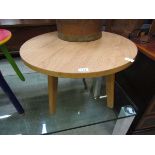 A laminated circular occasional table with 20th century design