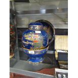 A blue ground oriental gilt design ginger jar by Carlton Ware along with matching bowl and dish