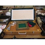 A travelling display case containing light unit, liner, etc