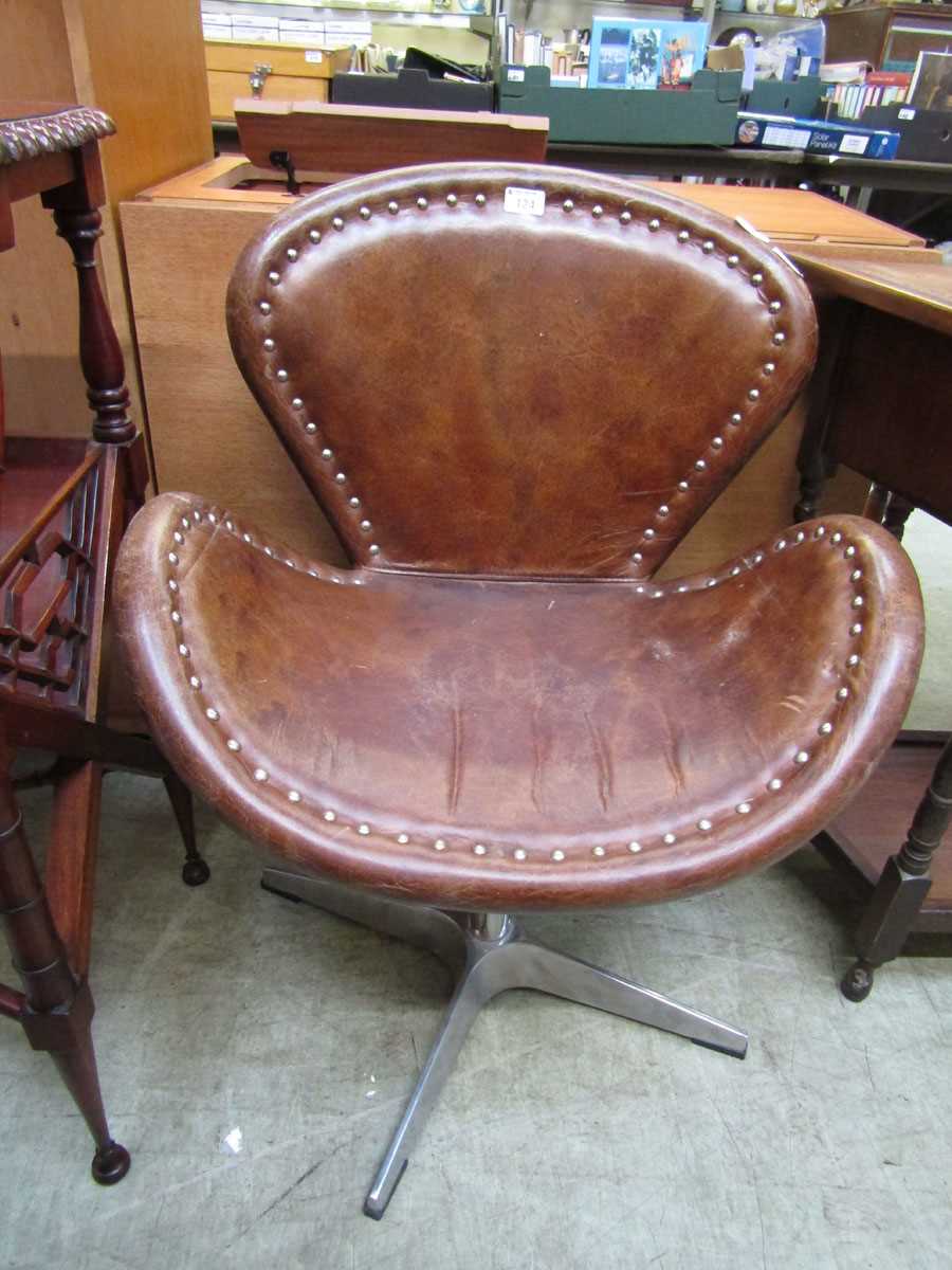 A reproduction Timothy Oulton 'Swan' chair