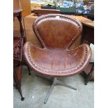 A reproduction Timothy Oulton 'Swan' chair