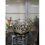 An Italian silver plated fruit bowl with silver hallmarked plaque to base with signature