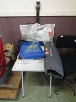 A selection of camping equipment to include folding table, elite single table, caravan sun awning,