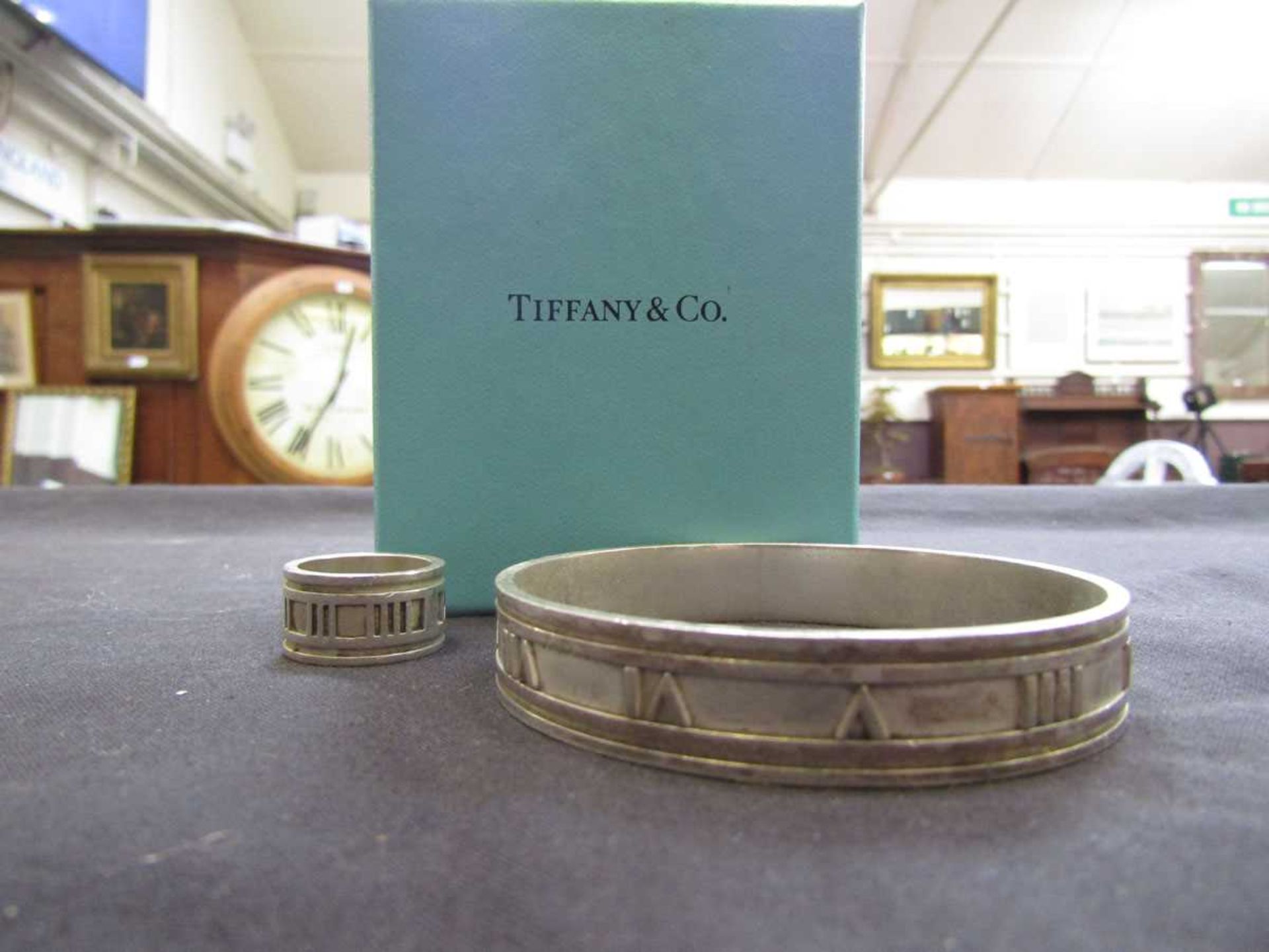 A white metal 'Atlas' design bangle marked 'Tiffany' together with a matching ring - Image 2 of 2