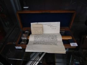 A presentation hammer in box with plaque to handle 'Presented To Thomas Bridge Esq On The Occasion