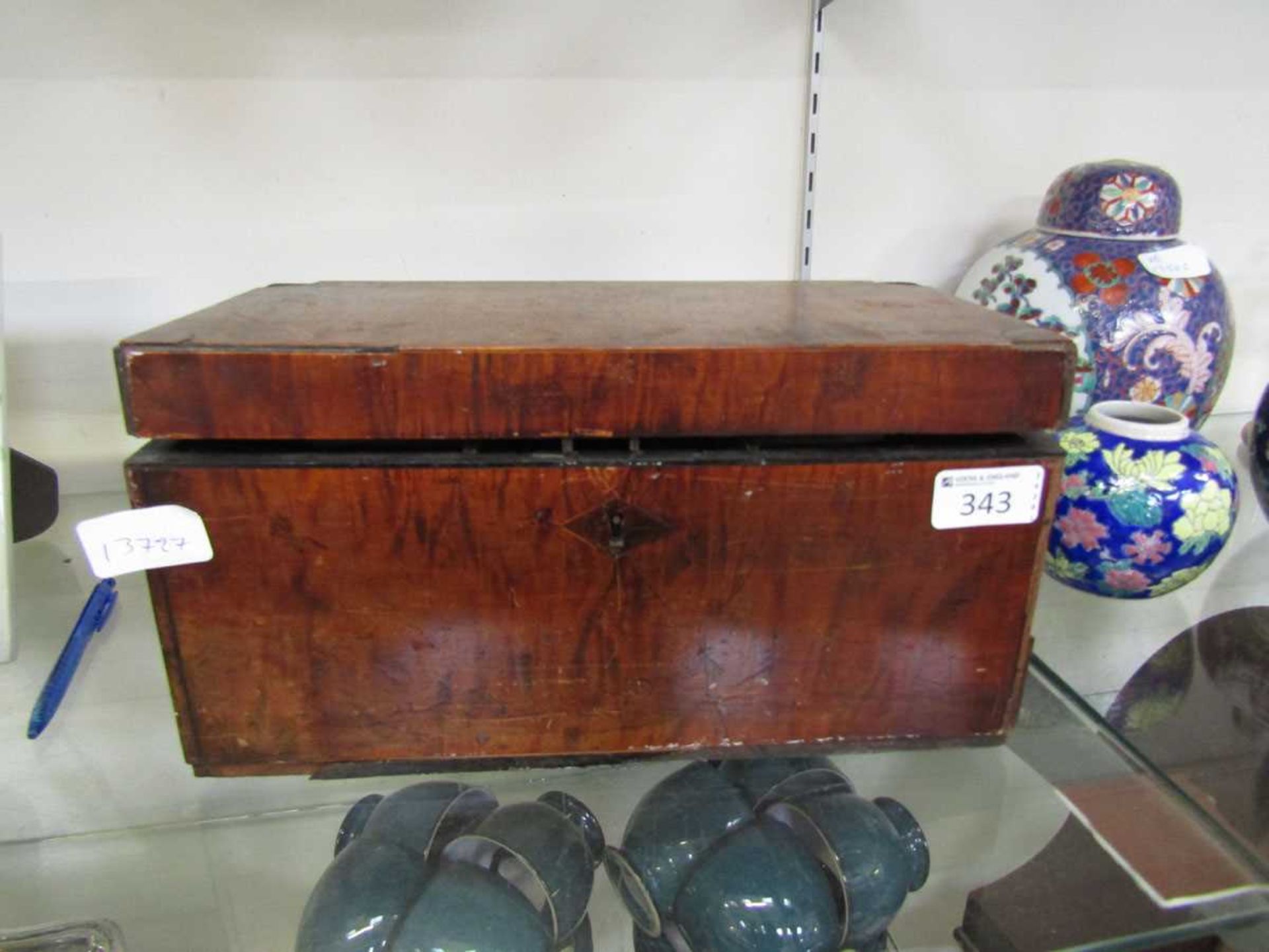 A walnut cased 19th century three compartment tea caddy