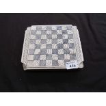 A marble travelling chess set with board to lid of box
