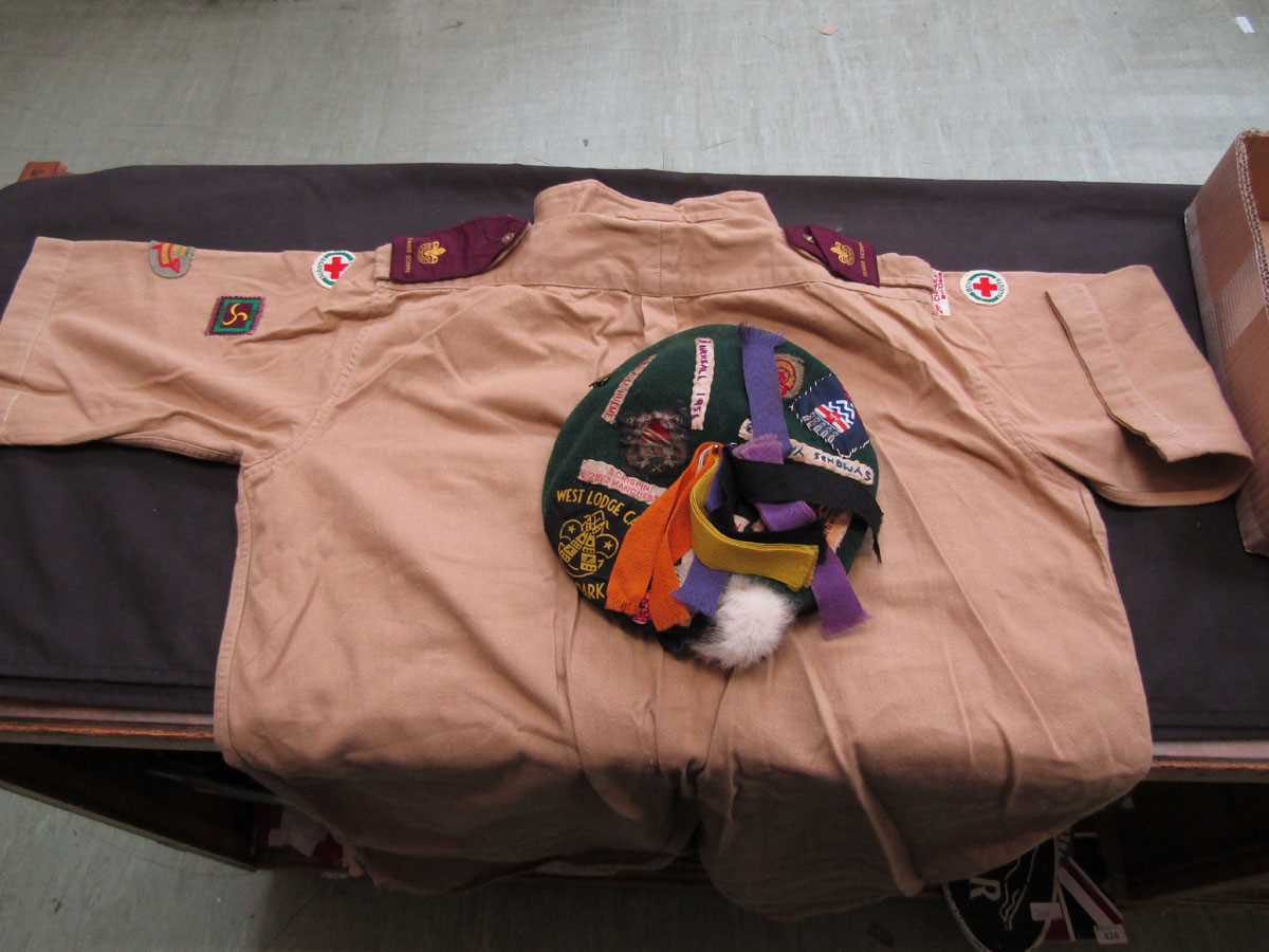 A boy scout's part uniform from 1950's to include cap, etc