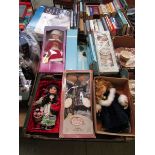 Two trays of costume dolls