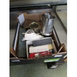 A box containing an assortment of metalware to include flatware, pewter tankard, collector's